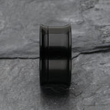 Detail View 2 of A Pair of Solid UV Smooth Flared Screw-Fit Ear Gauge Tunnel Plug-Black