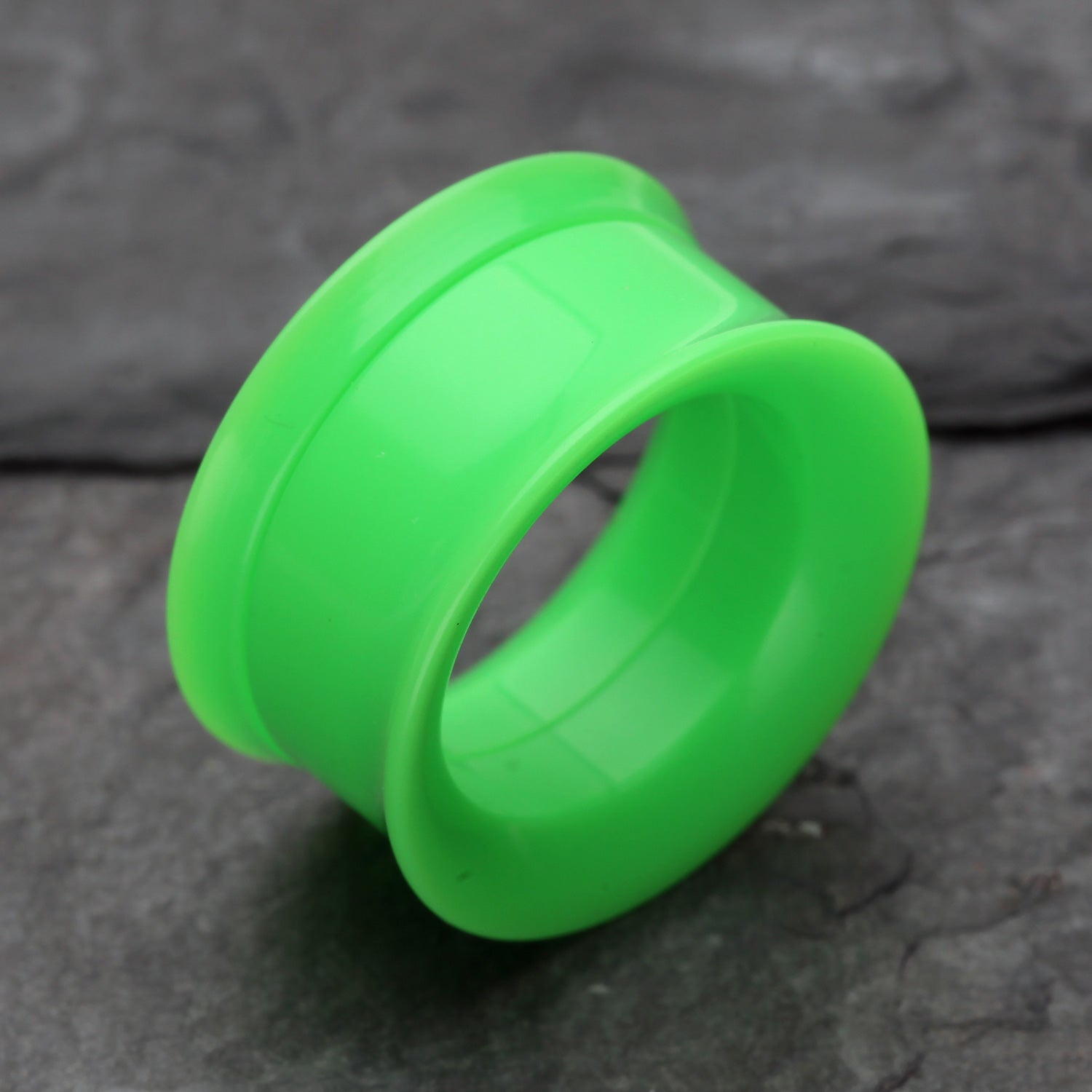 Detail View 1 of A Pair of Solid UV Smooth Flared Screw-Fit Ear Gauge Tunnel Plug-Green