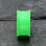 Detail View 2 of A Pair of Solid UV Smooth Flared Screw-Fit Ear Gauge Tunnel Plug-Green