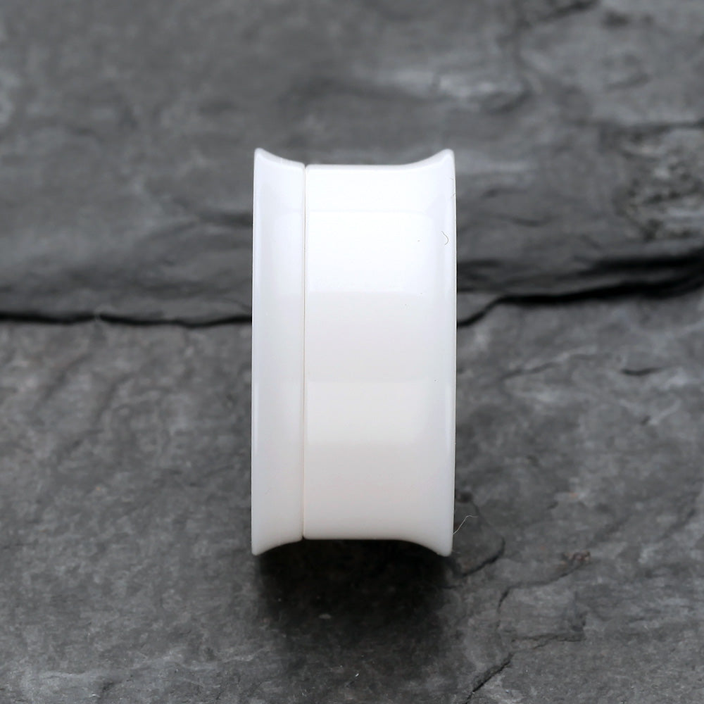 Detail View 2 of A Pair of Solid UV Smooth Flared Screw-Fit Ear Gauge Tunnel Plug-White