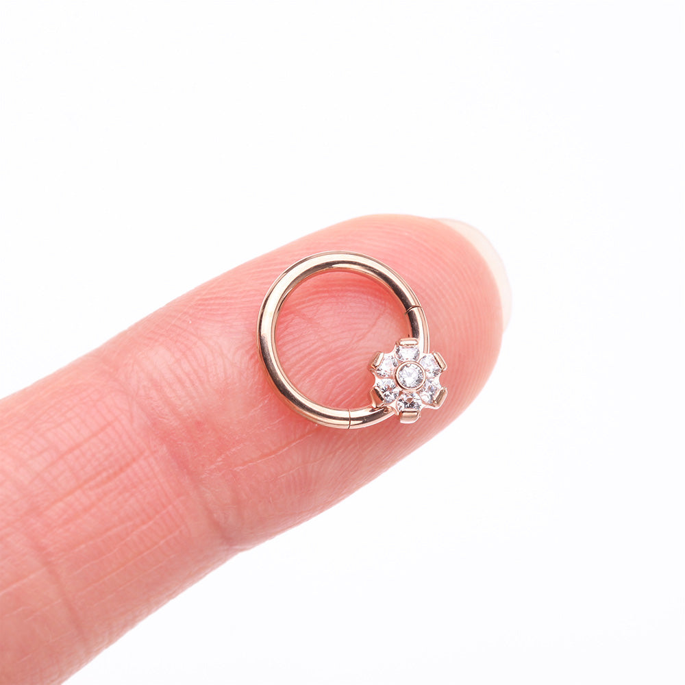 Detail View 2 of Implant Grade Titanium Rose Gold Brilliant Flower Sparkle Clicker Hoop Ring-Clear Gem