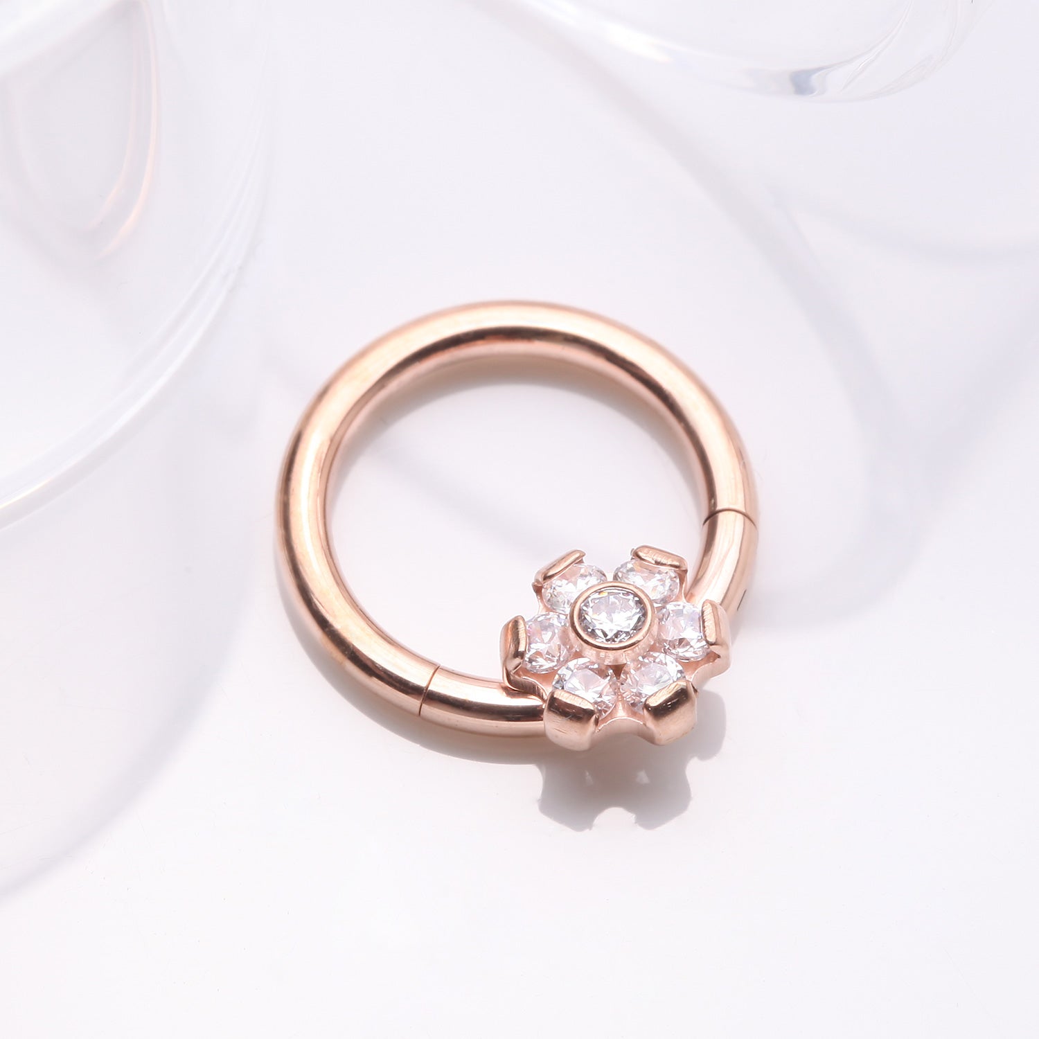 Detail View 1 of Implant Grade Titanium Rose Gold Brilliant Flower Sparkle Clicker Hoop Ring-Clear Gem