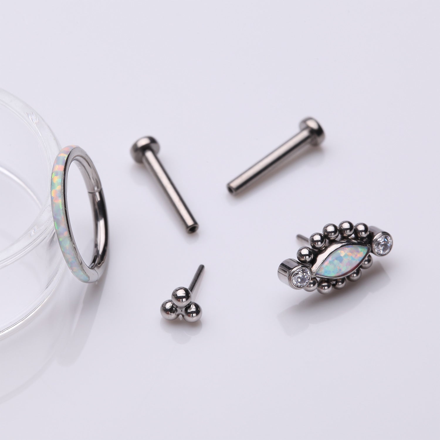 Detail View 1 of 3 Pcs of Assorted Titanium Bali Beaded Marquise Fire Opal Stud & Clicker Package