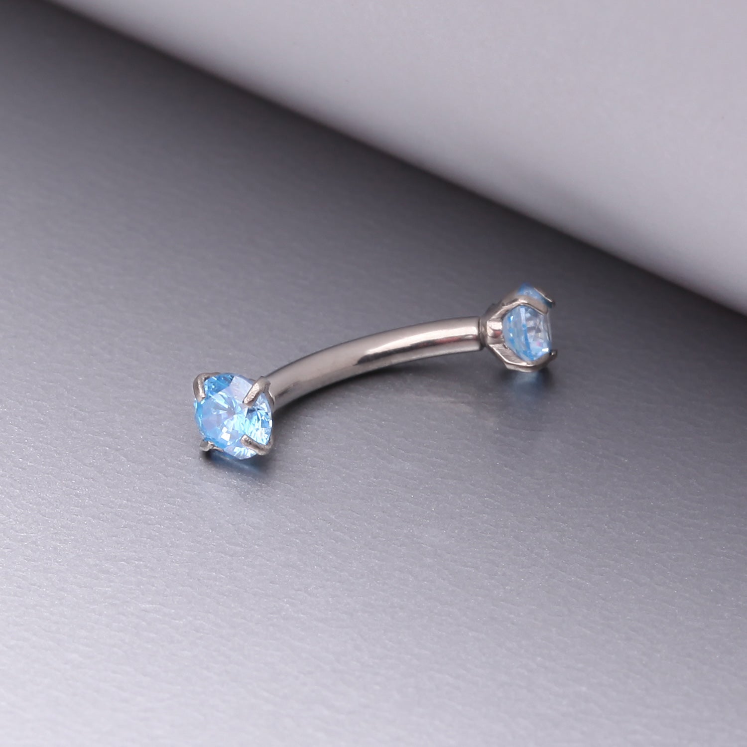 Detail View 1 of Implant Grade Titanium Prong Set Gem Sparkles Internally Threaded Curved Barbell-Aqua