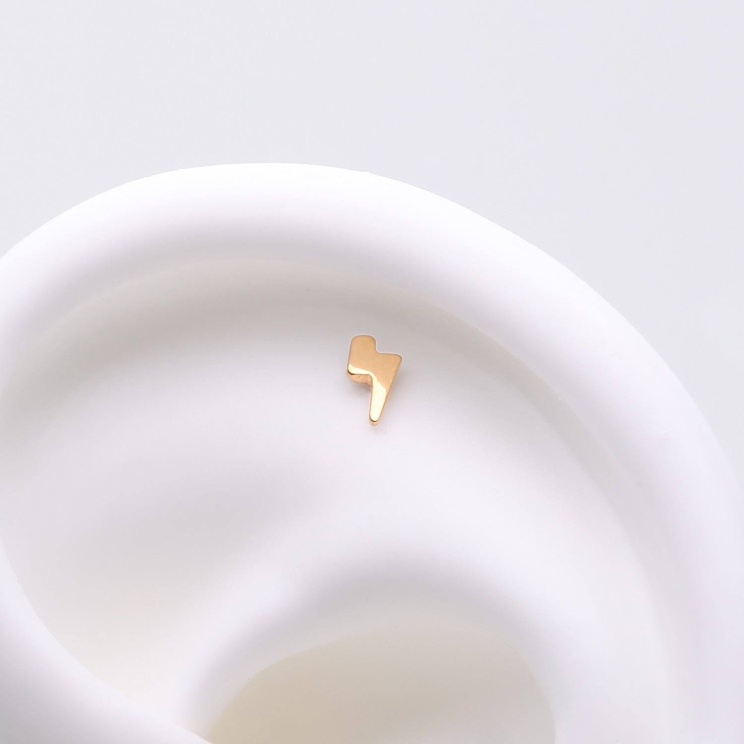 Detail View 1 of Implant Grade Titanium OneFit Threadless Golden Lightning Bolt Top Part