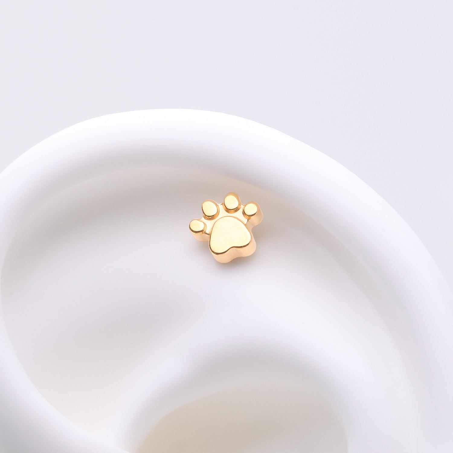 Detail View 1 of Implant Grade Titanium OneFit Threadless Golden Adorable Paw Top Part