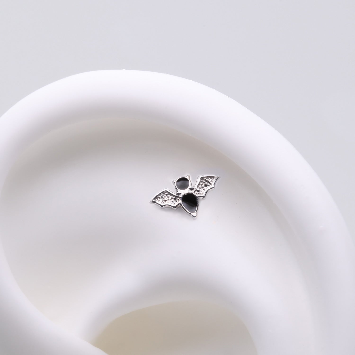 Detail View 1 of Implant Grade Titanium OneFit Threadless Flying Black Bat Top Part
