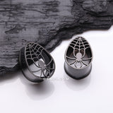 Detail View 1 of A Pair of Blackline Spider Webbed Teardrop Hollow Steel Tunnel Plug