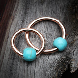 Detail View 1 of Rose Gold Turquoise Stone Ball Captive Bead Ring-Turquoise