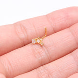 Detail View 2 of Golden Opalescent Star Sparkles L-Shaped Nose Ring-Clear Gem-Clear Gem/White
