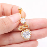 Detail View 3 of Golden Bubbly Heart Sparkle Bow-Tie Dangle Belly Button Ring-Clear Gem