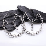 A Pair of Chained Skeleton Crucifix Plug Hoop Earring