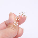 Detail View 2 of Golden Grand Sparkle Triple Flowers Steel Cartilage Tragus Barbell Stud-Clear Gem