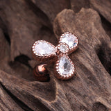 Detail View 2 of Rose Gold Shimmering Dayflower Cartilage Tragus Earring-Clear Gem