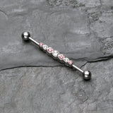 Detail View 1 of Dazzling Gem Row Industrial Barbell-Clear Gem/Pink