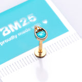 Detail View 2 of Golden Opalescent Teardrop Top Steel Labret-Teal