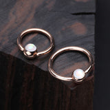 Detail View 1 of Rose Gold Opalescent Sparkle Captive Bead Ring-White