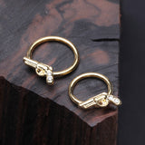 Detail View 1 of Golden Pistol Gun Sparkle Captive Bead Ring-Clear Gem