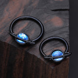 Detail View 1 of Blackline Opalescent Galaxy Planet Captive Bead Ring-Black/Blue
