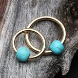 Detail View 1 of Golden Turquoise Stone Ball Captive Bead Ring-Turquoise