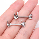 Detail View 2 of A Pair of Rock On Skeleton Hands Steel Nipple Barbell