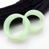 Detail View 1 of A Pair of Glow in the Dark Silicone Double Flared Ear Gauge Tunnel Plug-Clear Gem/White
