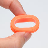 Detail View 2 of A Pair of Flexible Silicone Double Flared Ear Gauge Tunnel Plug-Orange