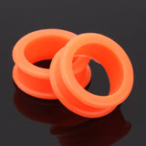 Detail View 1 of A Pair of Flexible Silicone Double Flared Ear Gauge Tunnel Plug-Orange