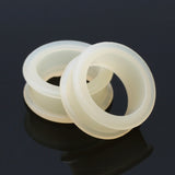 Detail View 1 of A Pair of Flexible Silicone Double Flared Ear Gauge Tunnel Plug-Peach