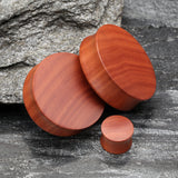 Detail View 1 of A Pair of Sabo Wood Double Flared Plug-Orange/Brown