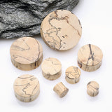 Detail View 2 of A Pair of Old Tamarind Wood Double Flared Plug