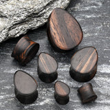 Detail View 2 of A Pair of Teardrop Tiger Ebony Wood Double Flared Plug