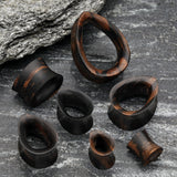 Detail View 2 of A Pair of Teardrop Tiger Ebony Wood Double Flared Tunnel Plug