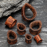 Detail View 2 of A Pair of Teardrop Coconut Wood Double Flared Tunnel Plug