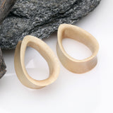 Detail View 1 of A Pair of Teardrop Crocodile Wood Double Flared Tunnel Plug