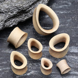 Detail View 2 of A Pair of Teardrop Crocodile Wood Double Flared Tunnel Plug