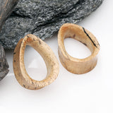 Detail View 1 of A Pair of Teardrop Old Tamarind Wood Double Flared Tunnel Plug