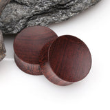 Detail View 1 of A Pair of Concave Dark Tamarind Wood Double Flared Plug