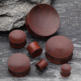 Detail View 2 of A Pair of Concave Dark Tamarind Wood Double Flared Plug