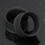 Detail View 1 of A Pair of Matte Black Steel Double Flared Ear Gauge Tunnel Plug-Black