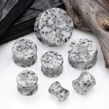 Detail View 2 of A Pair of Black Sesame Stone Double Flared Ear Gauge Plug