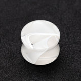 Detail View 1 of A Pair of Marble Swirl Acrylic Double Flared Ear Gauge Plug-Clear Gem