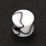 Detail View 1 of A Pair of Marble Swirl Acrylic Double Flared Ear Gauge Plug-White