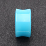 Detail View 2 of A Pair of Neon Colored UV Acrylic Double Flared Ear Gauge Plug-Light Blue