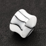 Detail View 1 of A Pair of Marble Swirl Acrylic Double Flared Ear Gauge Tunnel Plug-White