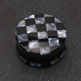 Detail View 1 of A Pair of Marble Checker Double Flared Ear Gauge Plug-Black