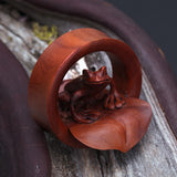 Detail View 1 of A Pair of Amazon Tree Frog Organic Sabo Wood Ear Gauge Plug