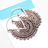 Detail View 4 of A Pair of Vintage Bali Warrior Emblem Copper Plug Hoop Earring