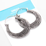 Detail View 4 of A Pair of Ancient Bali Ornate White Brass Loop Plug Hoop Earring