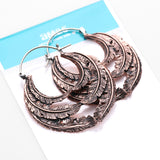 Detail View 4 of A Pair of Vintage Goddess Leaflet Loops Copper Plug Hoop Earring